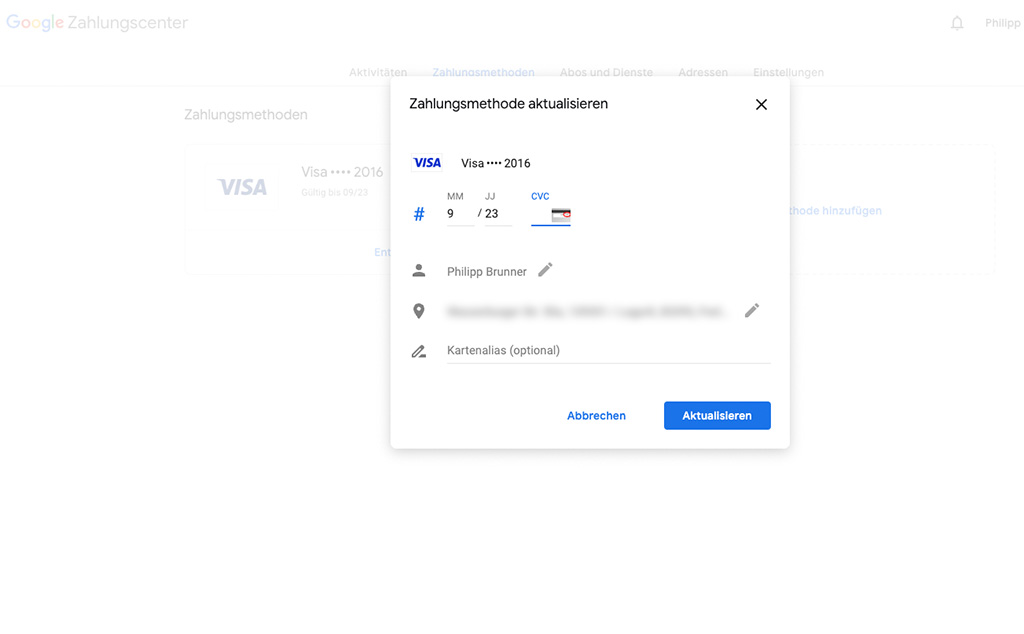A popup is being displayed for updating credit card details within Google Payments.
